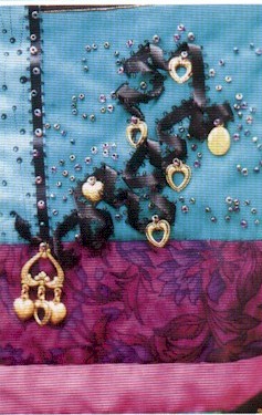 Ribbons wind their way through beads and charms